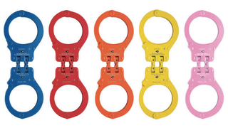 Illustration for article titled The Sordid History and Evolution of Handcuff Design